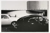 o.T. (2 Tatra-Modellautos vor Fotografie des Guggenheim-Museums)
